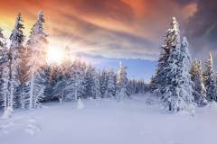 Beautiful winter sunrise in the mountains. Dramatic red sky